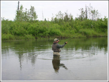 Fly Fishing Guides Flies Fishermen Gear Casting in the River 5-2012